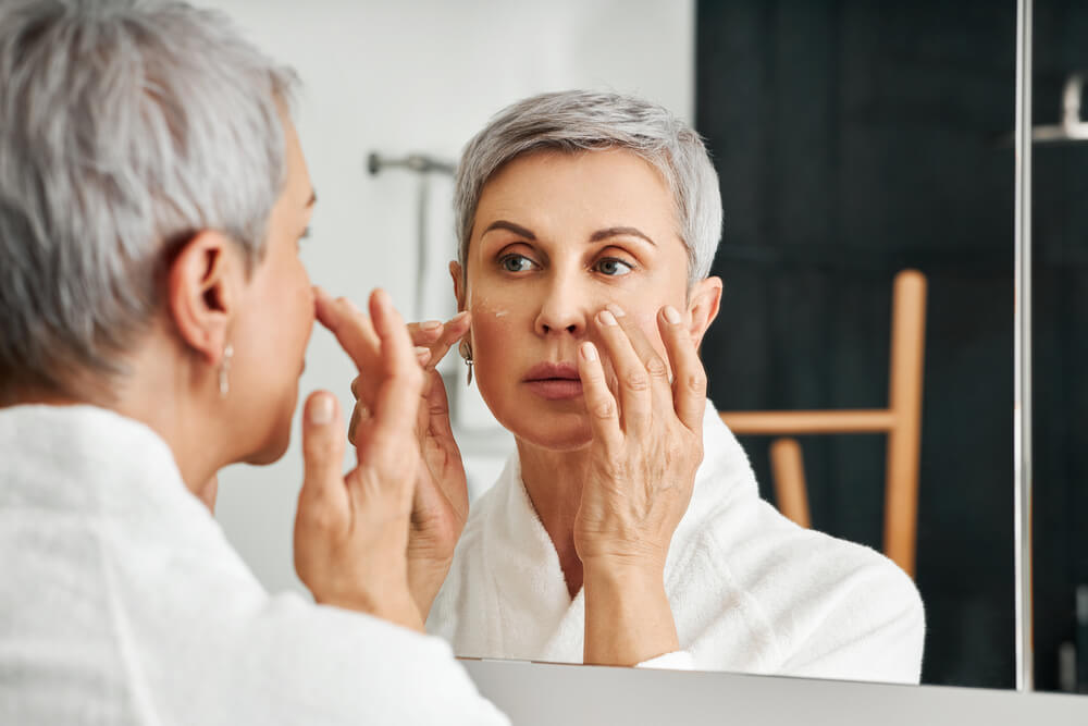 woman touching face